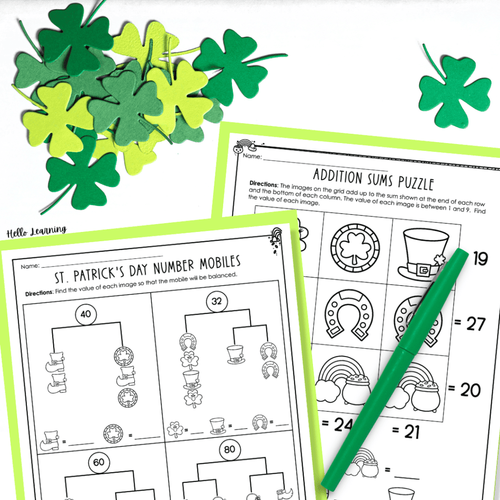 St. Patrick's Day math logic puzzles and brain teasers next to a pile of paper shamrocks